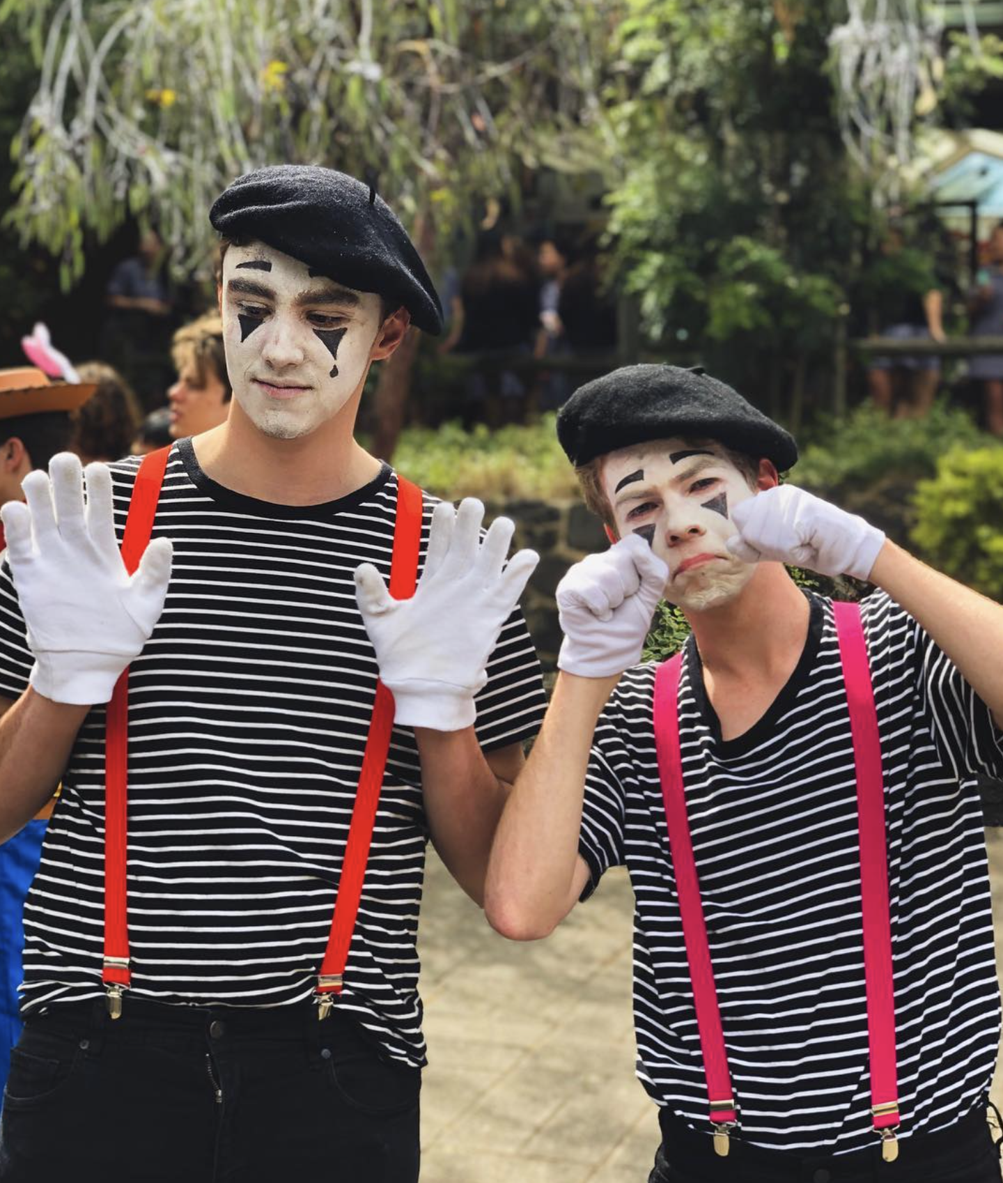 Young Pat in mime face paint — alternate identity energy